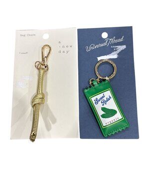 Set Of 2 Keychains: A New Day Gold Knot Bag Charm & Universal Thread Sweet Relis